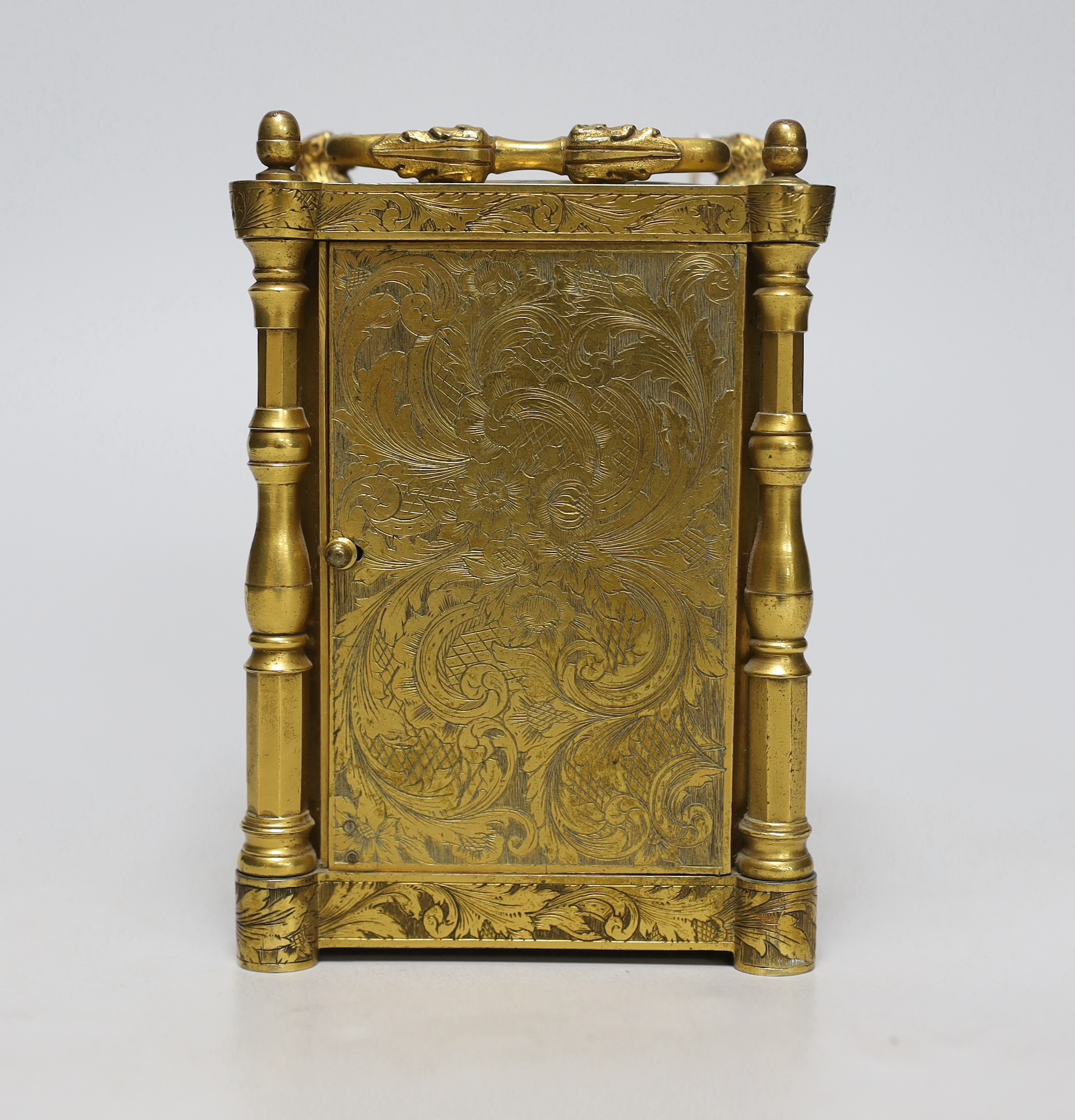 A mid 19th century French engraved gilt brass carriage clock, with tooled leather case, 16cm high
